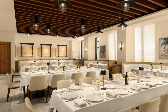 Aegan Priving Dining Room at Estiatorio Milos toronto with rows of tables