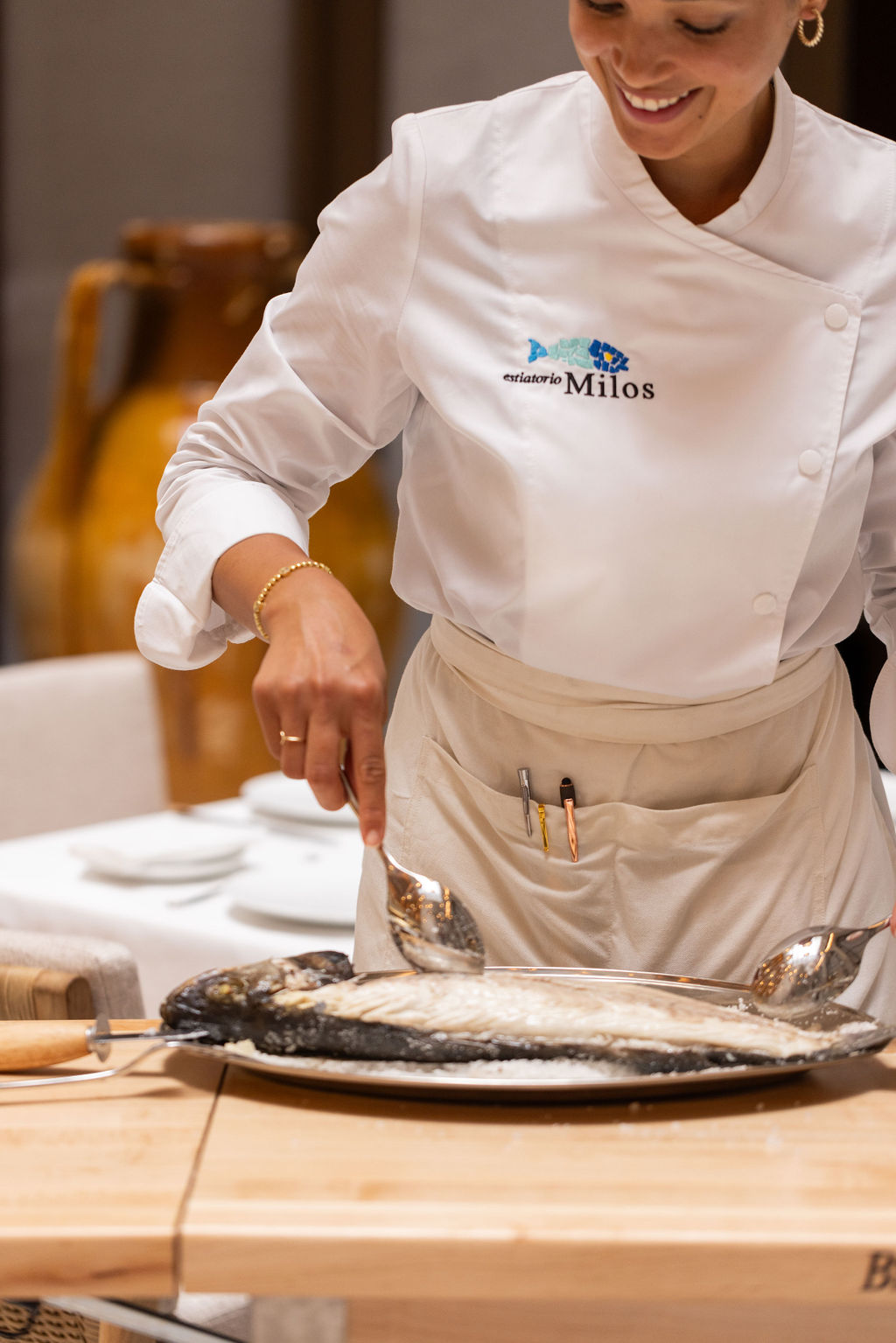 chef serving salt baked fish