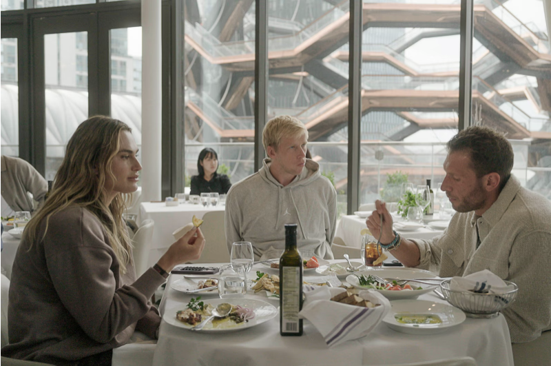 Aryna Sabalenka at estiatorio milos Hudson Yards with beautiful views of the Vessel in the background.
