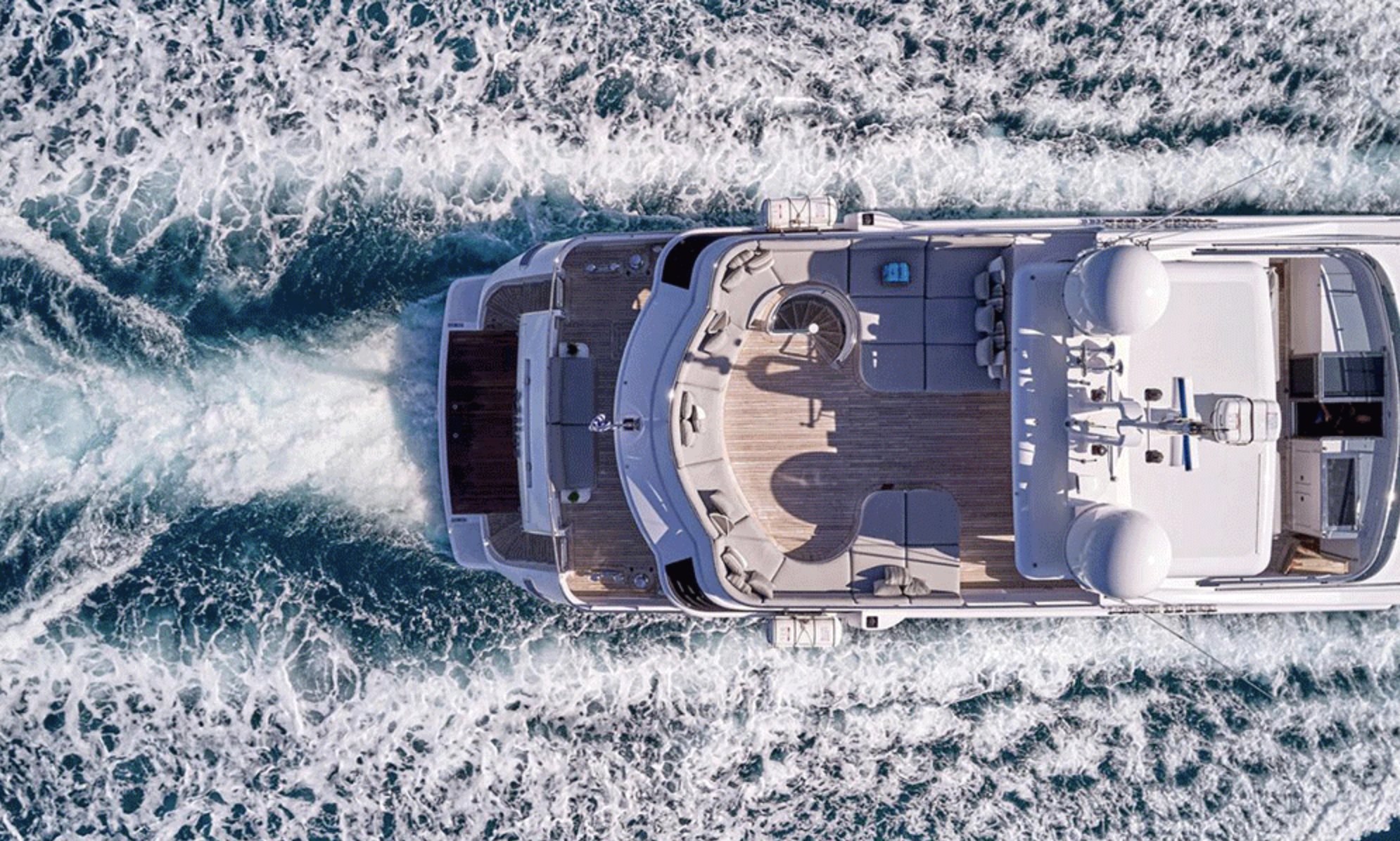 Milos at Sea overhead view of yacht cruising in the Aegean Sea